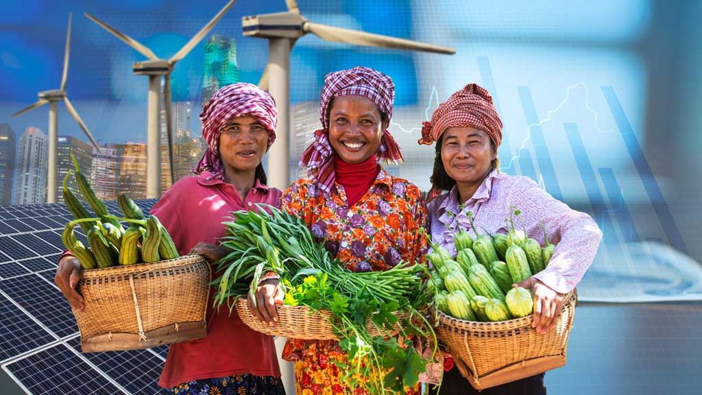Three women carrying produce in baskets.