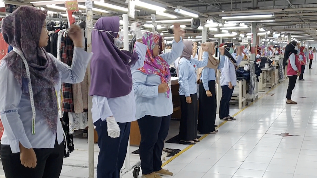 Workers lining up at a factory in Indonesia.
