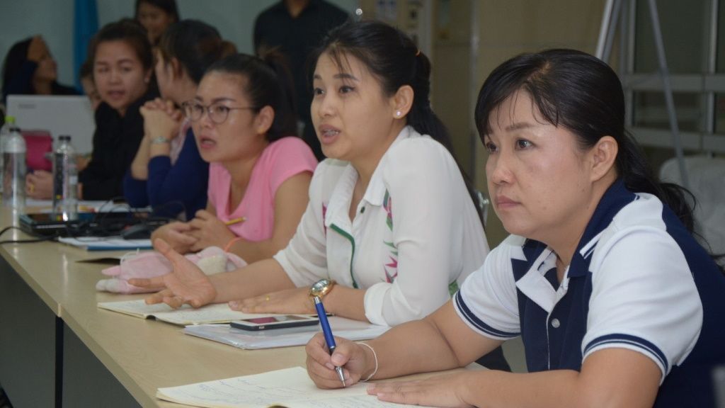 A dream come true: Sonny Sisomvang (seated at the rightmost) at the Thammasat University in Bangkok, Thailand, where she eventually graduated with a master’s degree in public health through the Health Sector Governance Program. Photo: Public Health Faculty, Thammasat University, Thailand.