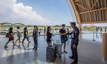 Travelers going through the Mactan airport in Cebu.