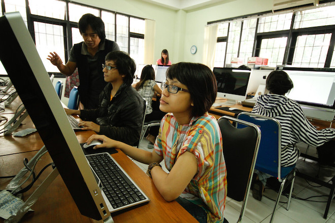 Students attending a computer class. 