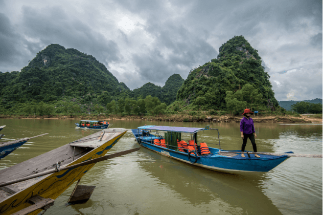 Tourist boats sail through the Mekong River.