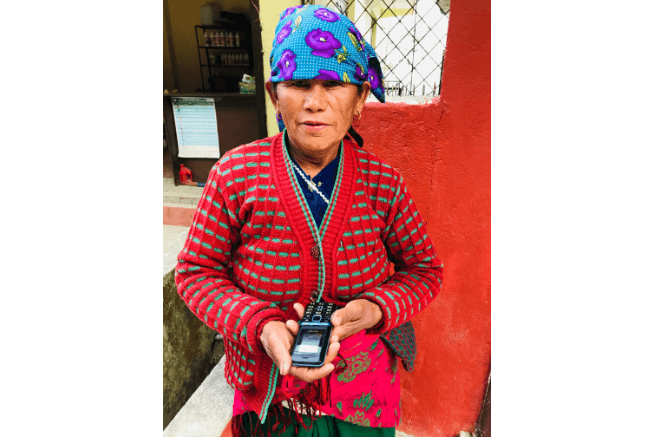 A micro-entrepreneur with her phone