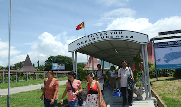 Passengers leaving the departure area of the Presidente Nicolau Lobato International Airport in Dili, Timor Leste