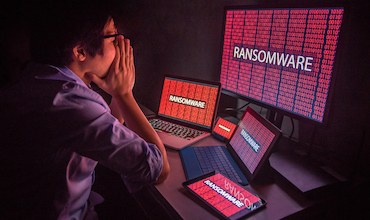 A man despairs as he fell victim to ransomware attack.