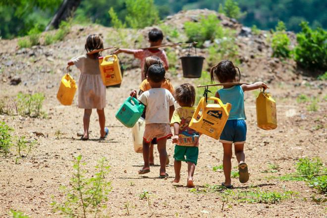 Children fetching water