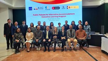 ADB Principal Tourism Industry Specialist Steven Schipani (seated, fourth from left), IQS School of Management's Director of Tourism and Hotel Management Department Gilda Hernández Maskivker (fifth from left), and ADB Consultant and Institutional and Capacity Development Specialist Pamela C. Asis-Layugan (standing, far right) with the mid-level and senior tourism officials who participated in the learning program. Photo credit: ADB.