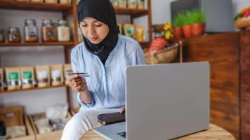 ASEAN is witnessing a significant surge in the adoption of digital payments, such as mobile wallets, virtual credit cards, and wire transfers. Photo credit: iStock/Kanawa_Studio.
