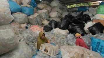 Workers at a plastics recycling plant in Indonesia. Photo credit: ADB.