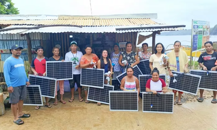 Target households in Surigao del Norte receive Solar Cloudgrid units. Photos courtesy of Light of Hope PH.