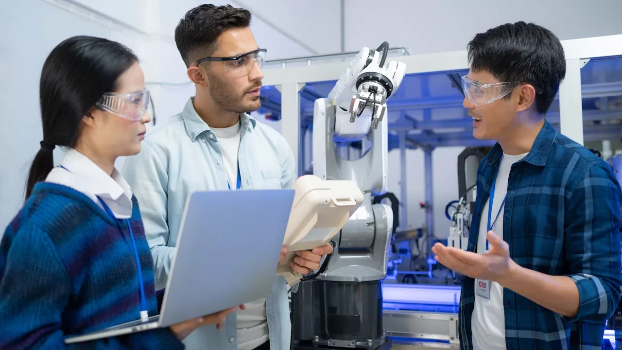 Three people at a tech lab. Photo credit: iStock.