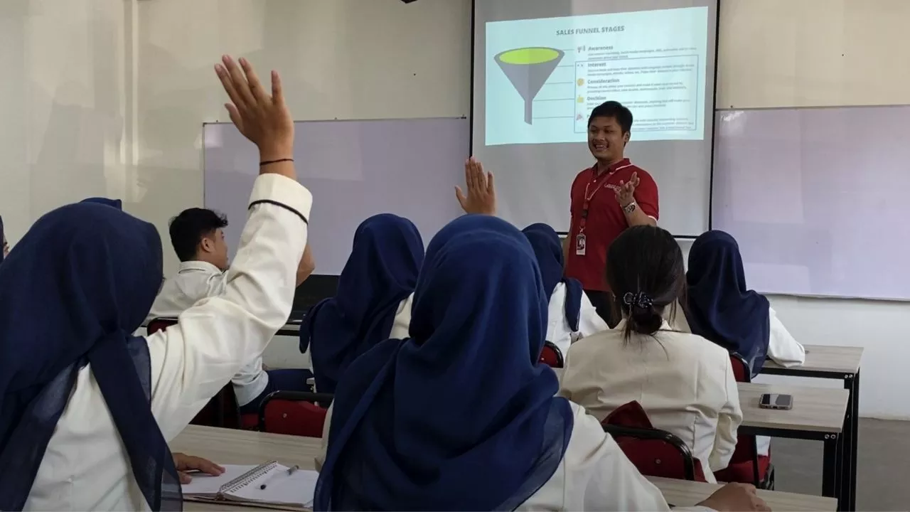 Horizon University students engage in a classroom session with their teacher, gaining practical skills and knowledge designed to prepare them for future careers. Photo credit: ADB.