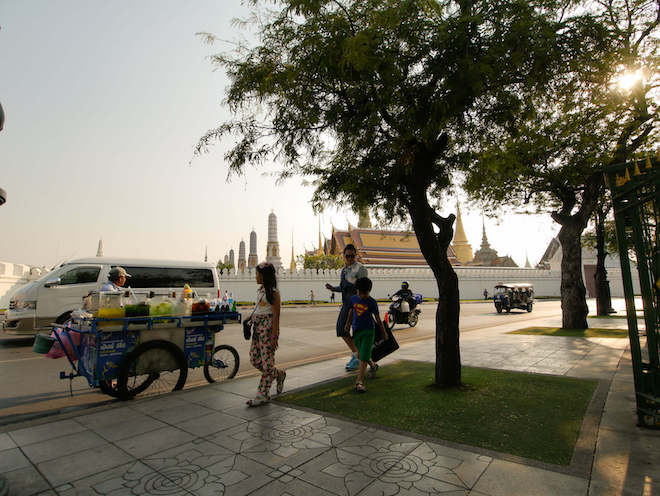 Pedestrians stroll through the streets of Thailand.